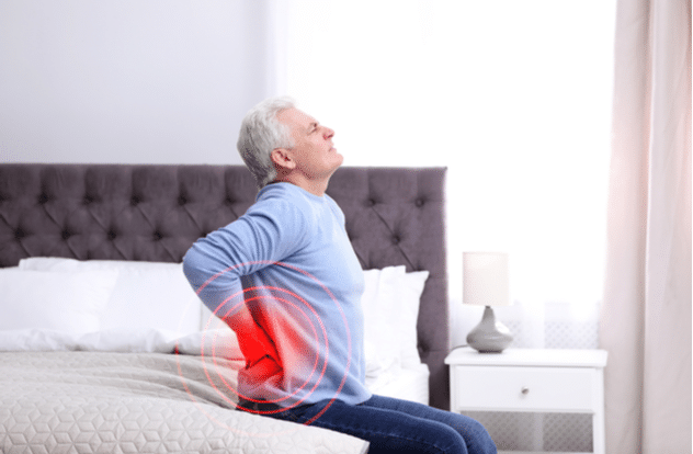 Senior man suffering from back pain